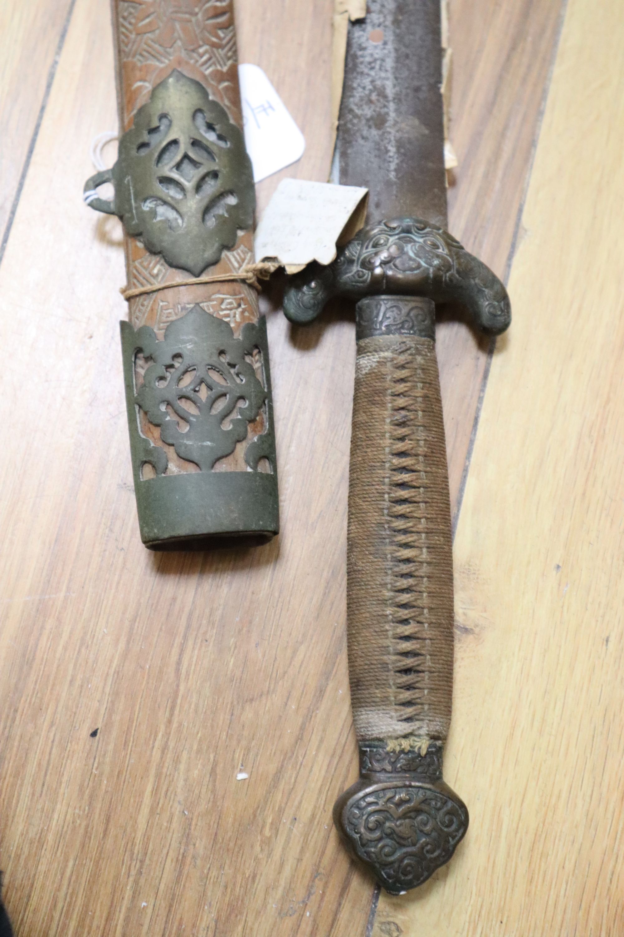 A Chinese double edge sword, Jian, late Qing, corroded